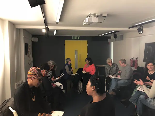 Small group workshop with seated discussions